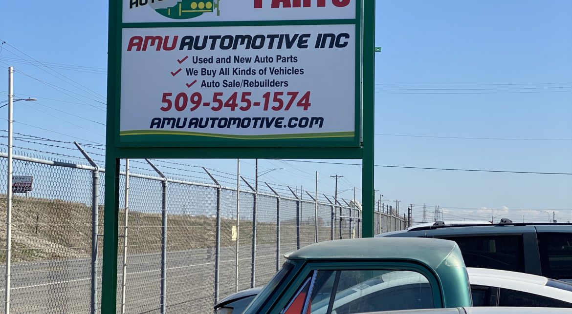 Sign advertising AMU Automotive Inc services