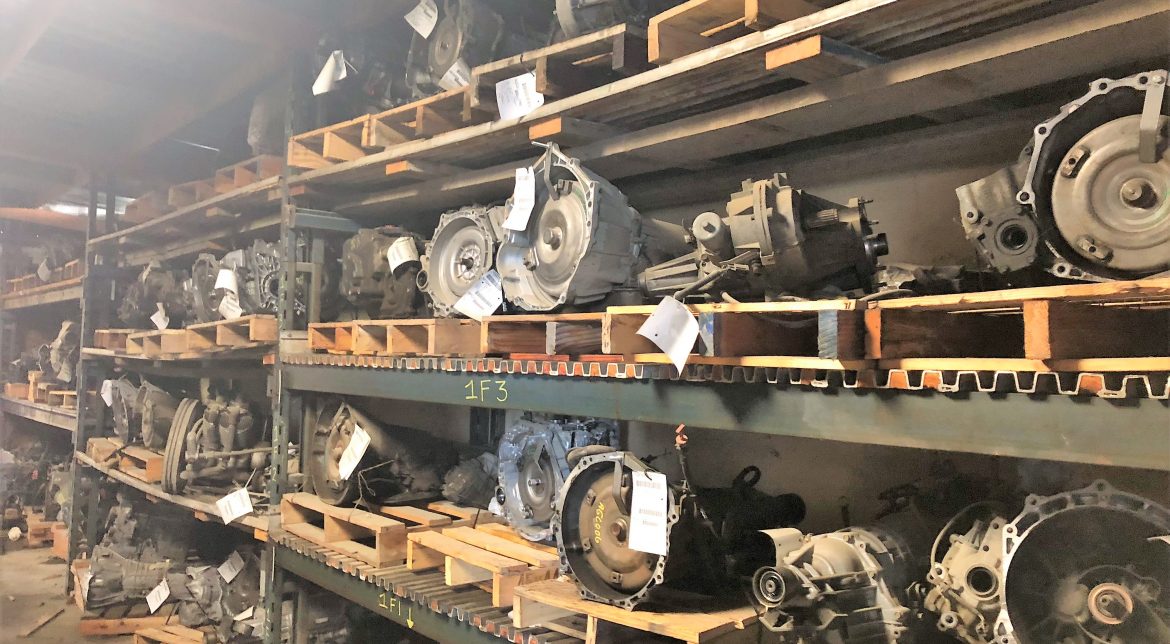 Car parts neatly arranged on storage shelves